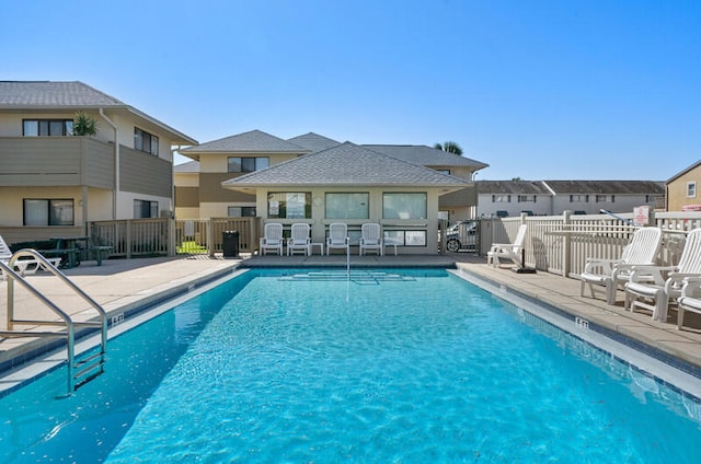 view of pool featuring a patio area