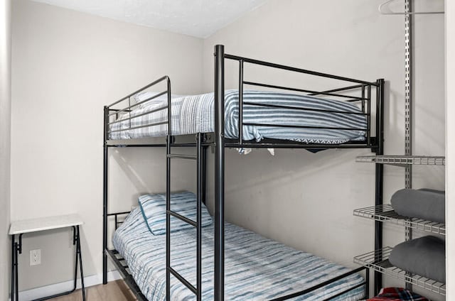 bedroom featuring hardwood / wood-style flooring