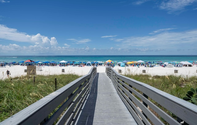 property view of water featuring a beach view