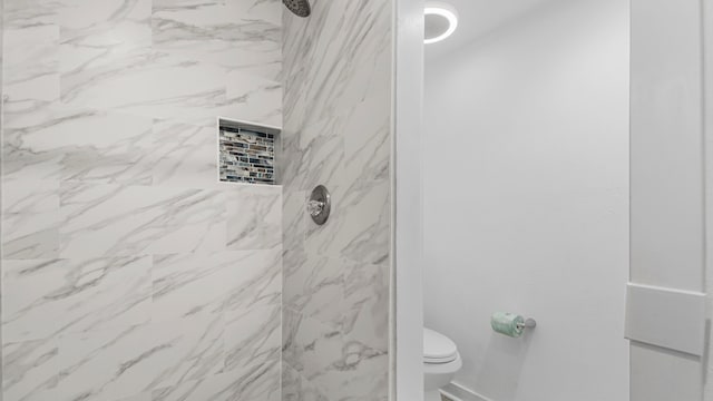 17709 Front Beach Rd Unit 2, Panama City Beach, FL 32413 - bathroom with toilet and tiled shower