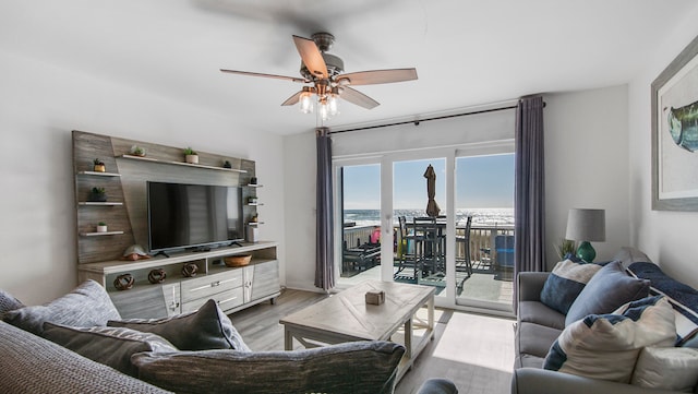 17709 Front Beach Rd Unit 2, Panama City Beach, FL 32413 - living room with ceiling fan and light hardwood / wood-style flooring
