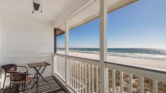 17709 Front Beach Rd Unit 2, Panama City Beach, FL 32413 - balcony with ceiling fan, a view of the beach, and a water view