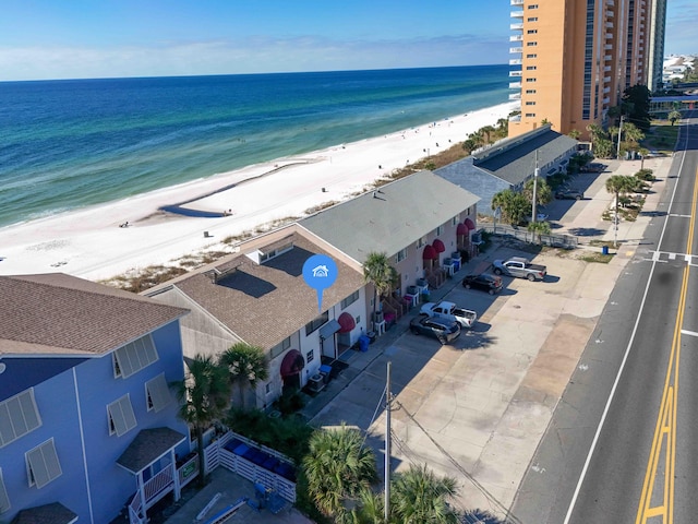 drone / aerial view with a view of the beach and a water view