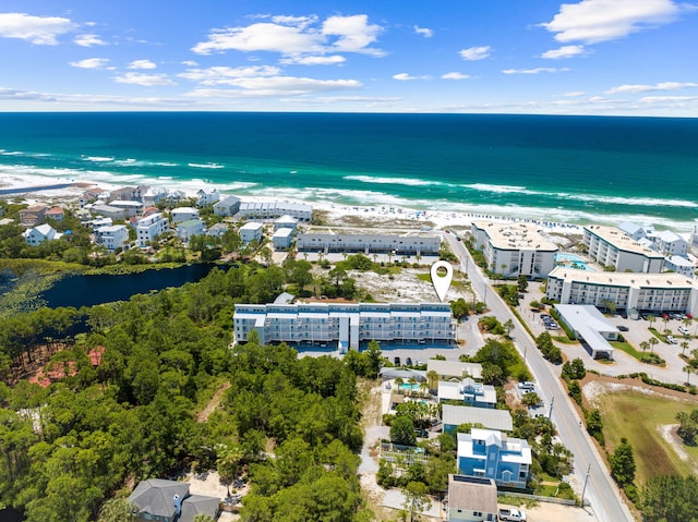 bird's eye view featuring a beach view and a water view