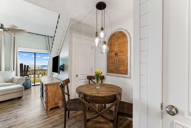 dining space featuring hardwood / wood-style floors