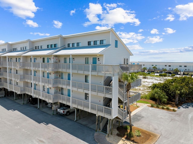 145 Beachfront Trl Unit 307A, Santa Rosa Beach, FL 32459 - view of apartment building / complex with covered parking and stairway