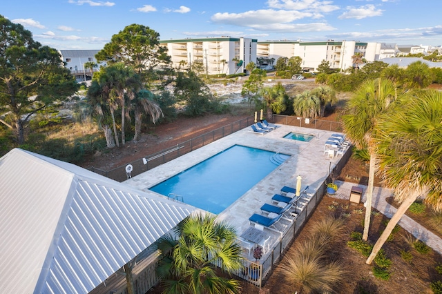 view of swimming pool with a patio area