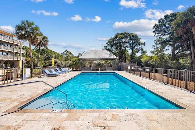 view of pool with a gazebo and a patio area