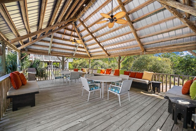 wooden terrace with a gazebo and outdoor lounge area