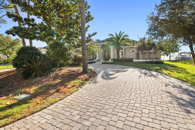 view of front of property with a front lawn