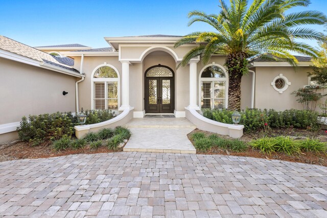 view of exterior entry with french doors