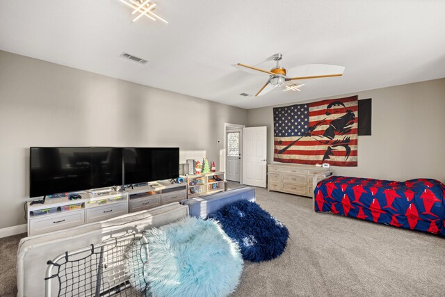 carpeted living room featuring ceiling fan