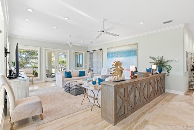 125 Emerald Rdg, Santa Rosa Beach, FL 32459 - living room with recessed lighting, a ceiling fan, ornamental molding, a barn door, and light wood-style floors