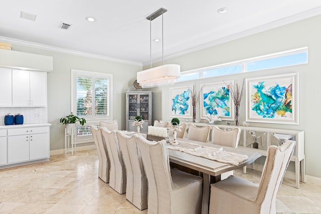 dining space featuring breakfast area, ornamental molding, and a wall mounted AC