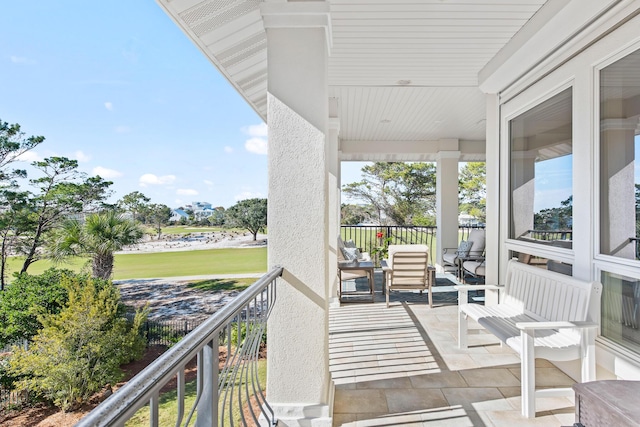 balcony featuring covered porch