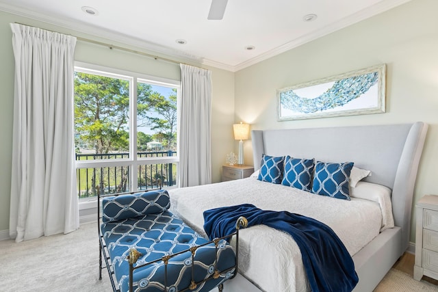 bedroom with carpet flooring, ceiling fan, and crown molding