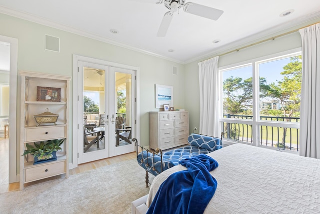 bedroom with access to exterior, french doors, light wood-type flooring, ornamental molding, and ceiling fan