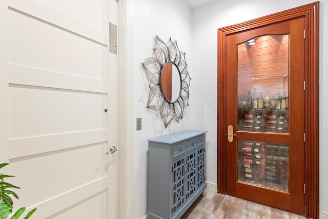 doorway to outside featuring light hardwood / wood-style flooring