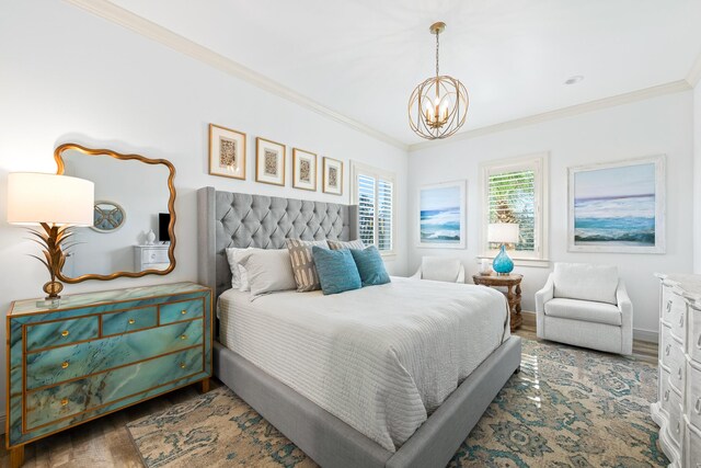 125 Emerald Rdg, Santa Rosa Beach, FL 32459 - bedroom with a chandelier, wood finished floors, and ornamental molding