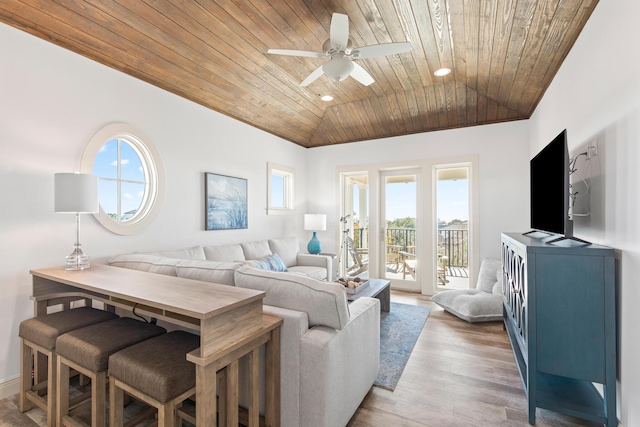 living room with ceiling fan, wood ceiling, vaulted ceiling, and hardwood / wood-style flooring