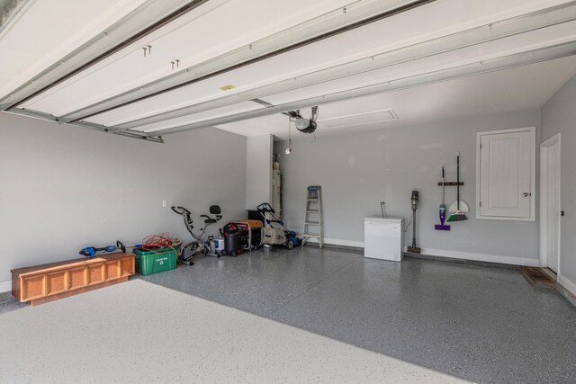 garage featuring a garage door opener