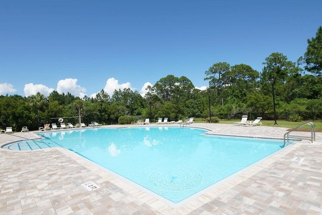 view of pool with a patio area