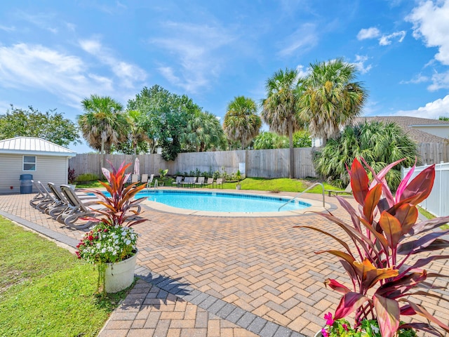 view of pool featuring a patio area