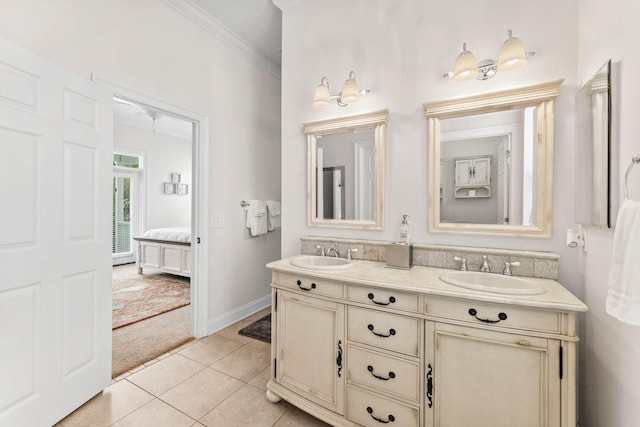 bathroom featuring tile patterned flooring, vanity, and ornamental molding