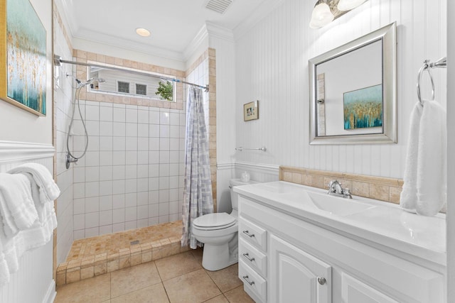 bathroom featuring tile patterned flooring, a shower with curtain, toilet, and ornamental molding