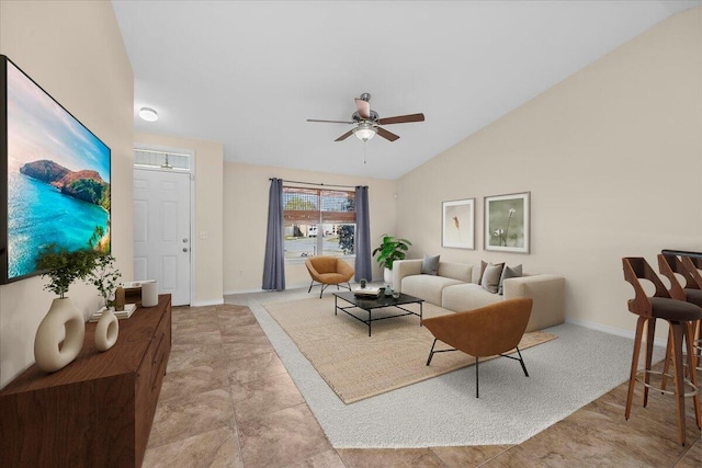 living room with ceiling fan and lofted ceiling