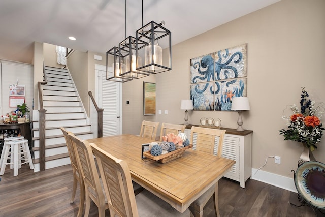 dining space with dark wood-type flooring