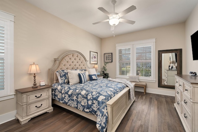 bedroom featuring ceiling fan and dark wood-type flooring