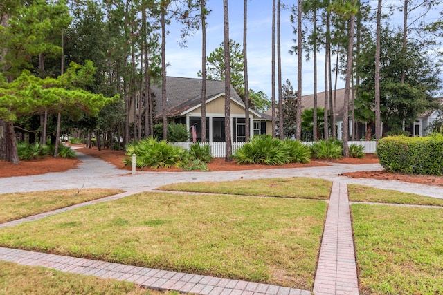 view of front facade with a front lawn