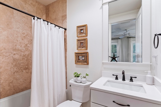 full bathroom with vanity, ceiling fan, toilet, and shower / tub combo