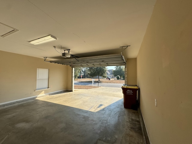 garage featuring a garage door opener