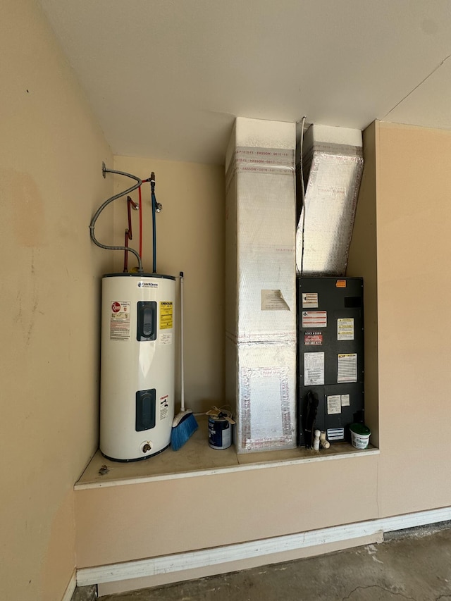 utility room featuring water heater and heating unit