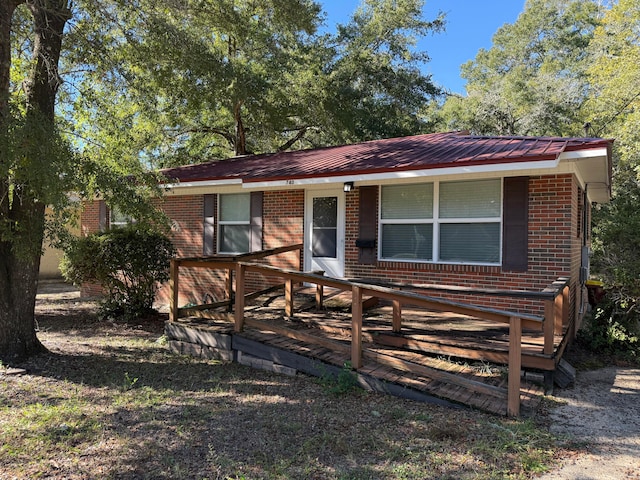 view of front of property with a deck