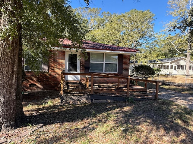 exterior space featuring a deck