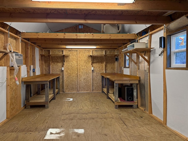 basement featuring an AC wall unit