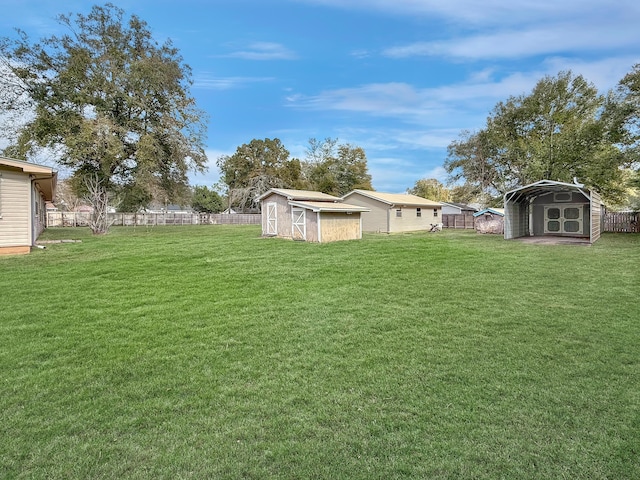 view of yard with a storage unit