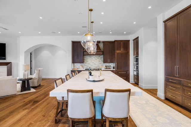 dining room featuring wood-type flooring