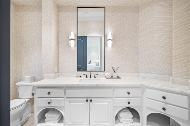 bathroom with vanity and toilet