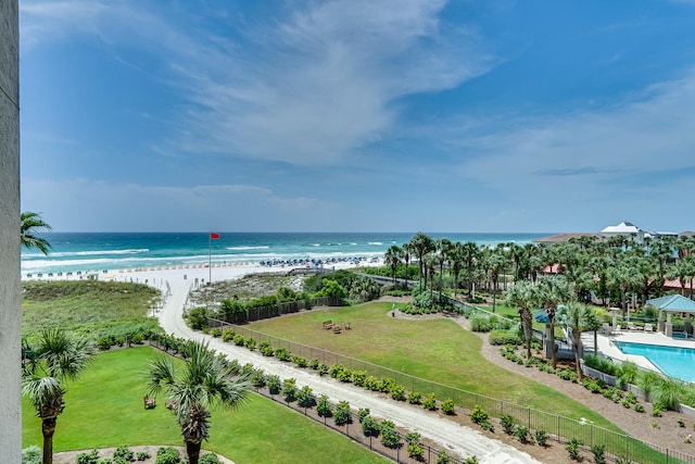 aerial view with a water view and a view of the beach