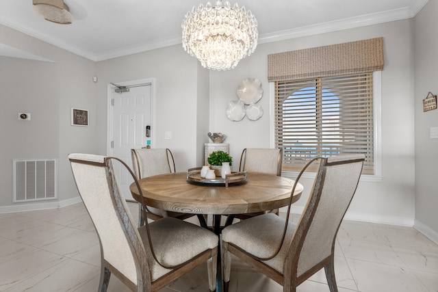 dining space with ornamental molding and a notable chandelier