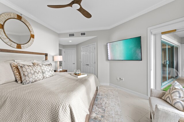 bedroom with a closet, ceiling fan, and crown molding