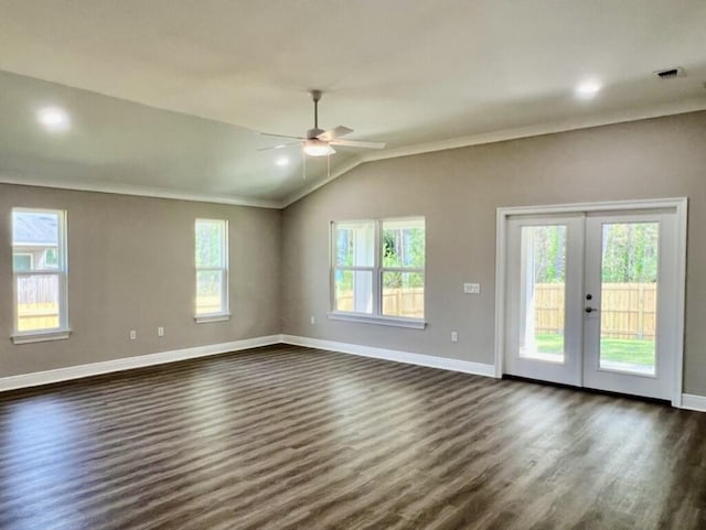 8405 Sevilla St, Navarre, FL 32566 - unfurnished room featuring healthy amount of natural light, a ceiling fan, dark wood-style floors, baseboards, and lofted ceiling