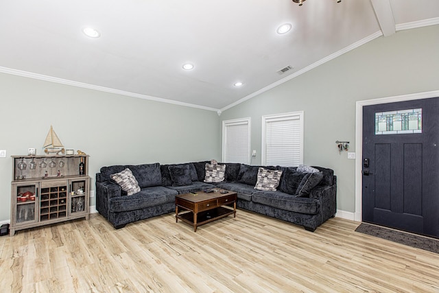 living room featuring vaulted ceiling with beams, crown molding, and light hardwood / wood-style flooring