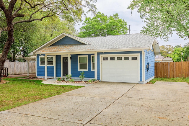 1013 Gloria Ave, Fort Walton Beach, FL 32547 - single story home with an attached garage, a porch, driveway, and roof with shingles