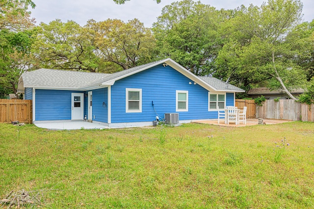 1013 Gloria Ave, Fort Walton Beach, FL 32547 - rear view of property featuring a patio, cooling unit, and roof with shingles