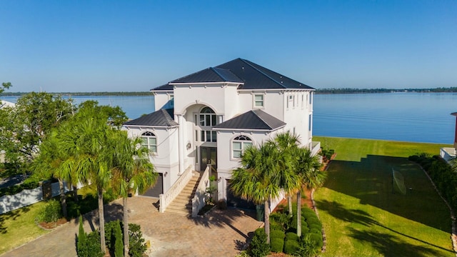 birds eye view of property featuring a water view